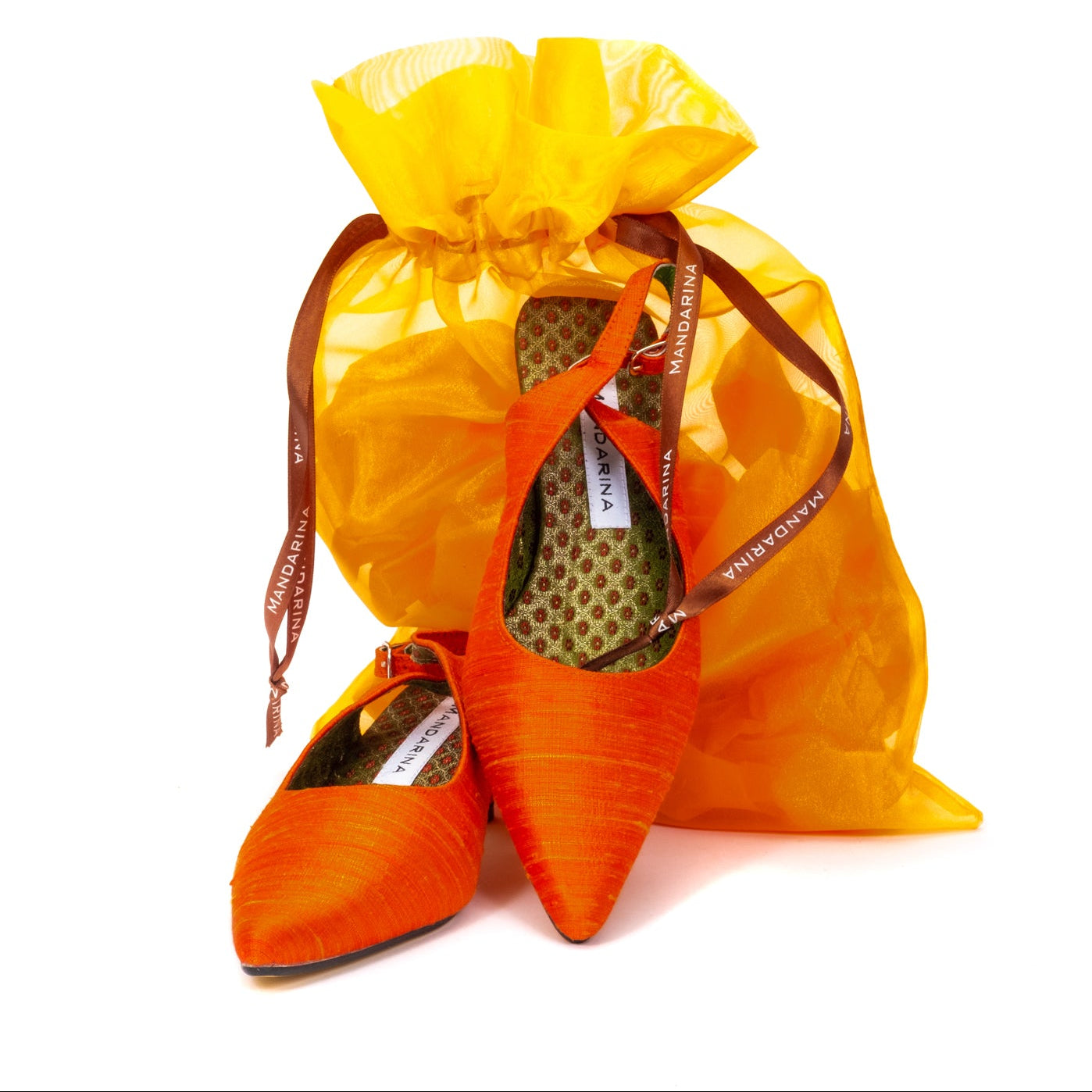 Mandarina Shoes orange branding