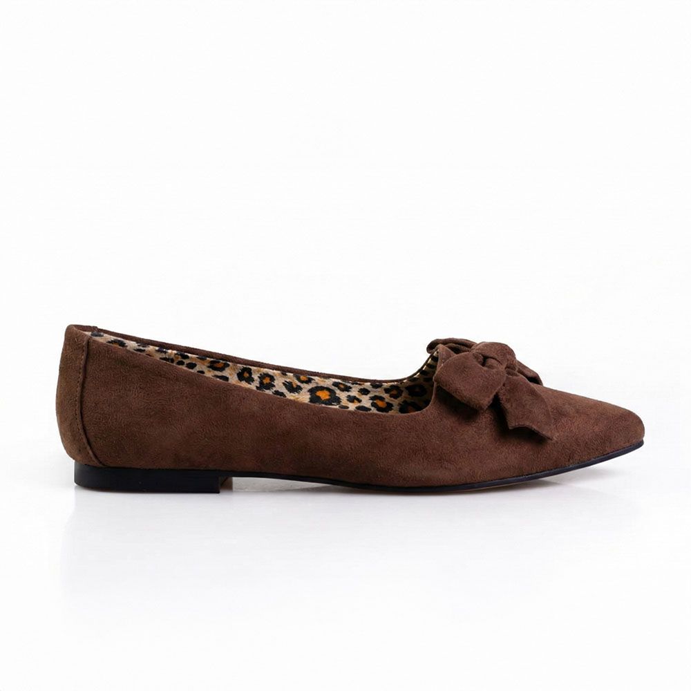 Brown flat shoe with a bow and leopard print insole on a white background