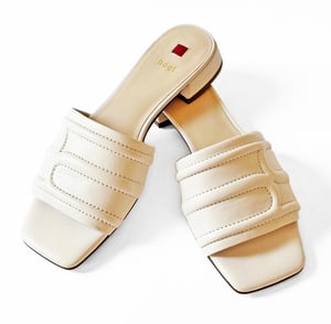 white leather slip on sandals