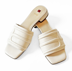 white leather slides